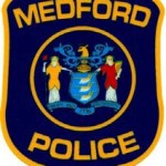 Two men arrested after vandalism reports at Medford Lanes