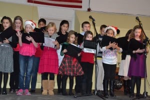 The Christ Our Light Children’s Choir performed a number of holiday songs during the ceremony. 