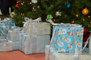 Stacks of gifts sit at the foot of Cherry Hill Township’s Christmas tree.