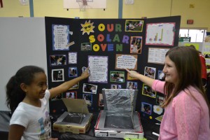 Two partners at the fair were fourth-graders Brielle Castillo, age 10, left, and Gianna Tapp-Schultz, age 9, right, who created a project based around cooking food using only the heat of the sun. 