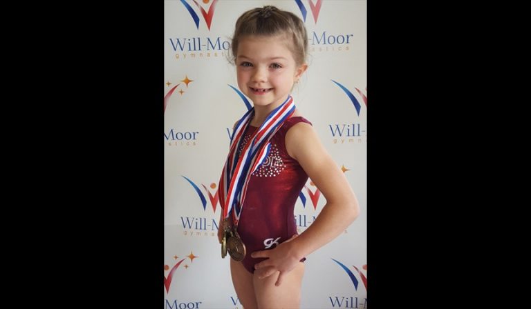 Life upside down: Seven-year-old gymnast is a New Jersey champion