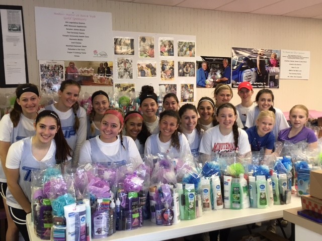 WTHS girls lacrosse pay it forward with community service project