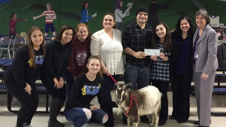 WTHS P.A.W.S. Club donates $1,300 to animal sanctuary