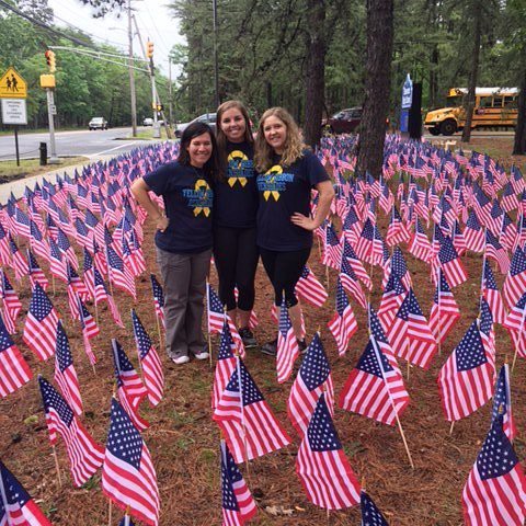 Shawnee’s Yellow Ribbon Club decorates Shawnee High School’s front lawn