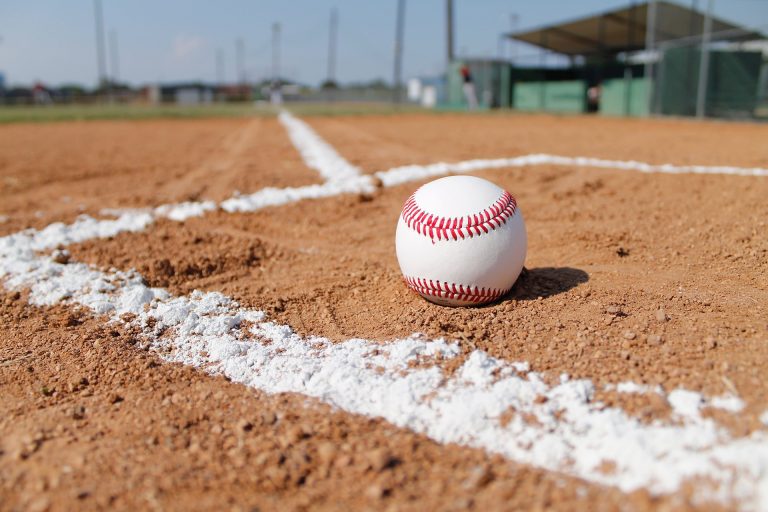 Student vs. staff at Spring Swing Softball Challenge