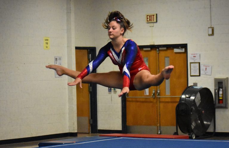 Hard work, tradition and family are keys to victory for Washington Township gymnastics