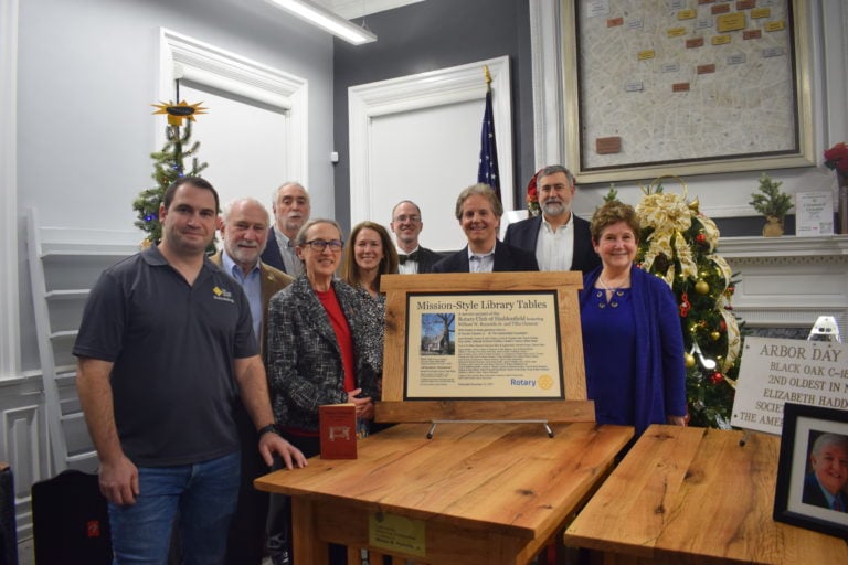 Rotary donates and dedicates two reading tables to the library